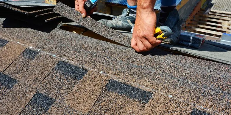 Highland Homes Roofing - Working on roof